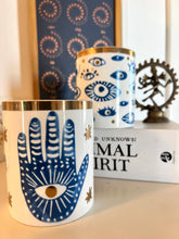 Load image into Gallery viewer, Beautiful Gold, Blue &amp; White Ceramic "Evil Eye" Candle
